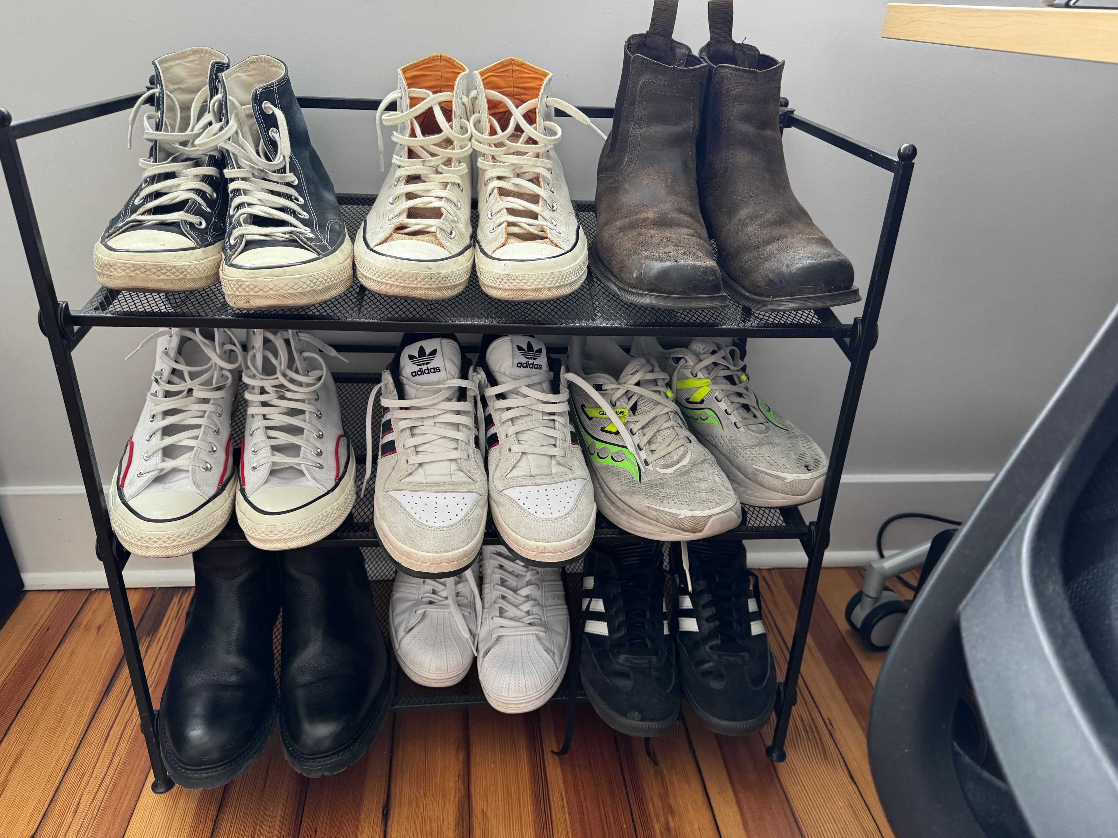 Shoe rack with sneakers and boots